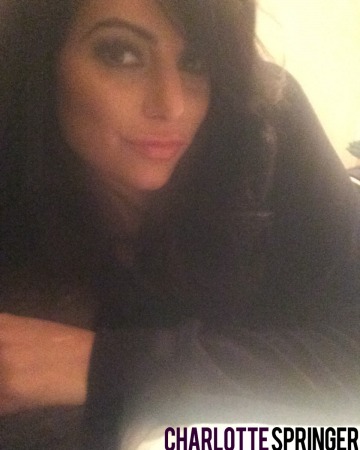 Strips her black top and lingerie