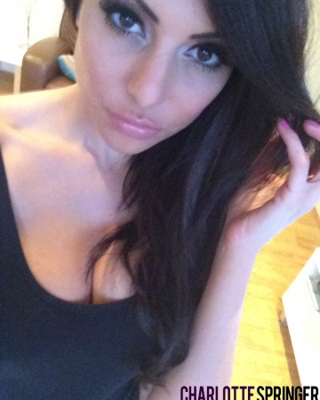 Strips from her tight black top